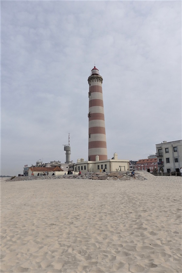 Wondering what to see in Aveiro? Visit Farol da Barra, the tallest lighthouse in Portugal pictured here.