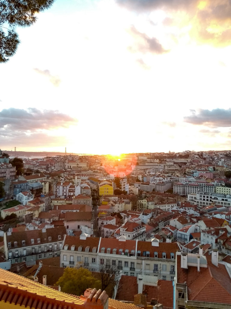Sunset at the Graça viewpoint in Lisbon